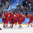 GANGNEUNG, SOUTH KOREA - FEBRUARY 25: Kirill Kaprizov #77 of the Olympic Athletes from Russia celebrates with teammates after scoring the 4-3 overtime gold medal winning goal against Germany at the PyeongChang 2018 Olympic Winter Games. (Photo by Andre Ringuette/HHOF-IIHF Images)

